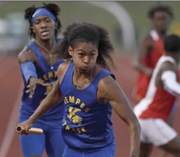 Kemper County's 4 x 400 meter relay completes a baton exchange at the
MHSAA Track & Field State Championships for Class 2A on Friday, April 29,
2022, at Pearl High School in Pearl, Miss.